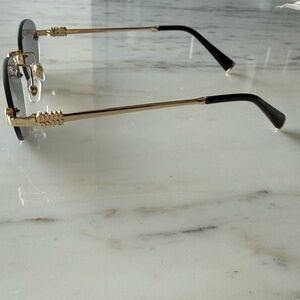 Miu Miu Gold and Black Sunglasses